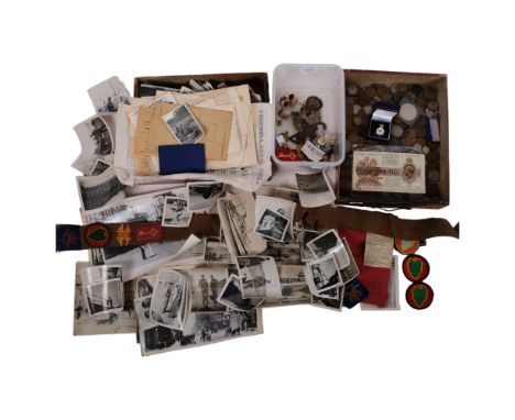 A quantity of photographs, postcards and associated ephemera, some war and service related in nature, including many items re