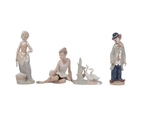 A Lladro clown, 21.5cm, and 3 NAO figures 