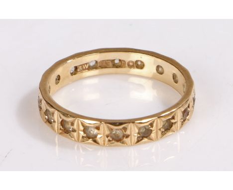 9 carat gold eternity ring set with clear stones, ring size M 1/2, 1.8g