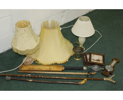 Works of art, to include two onyx lamps, a barometer, an ice bucket, a pewter quaich, walking sticks, lamp shade, three frame