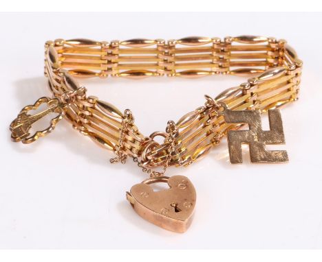 9 carat gold gate link bracelet, with heart shaped padlock clasp and good luck pendant, 23.5g