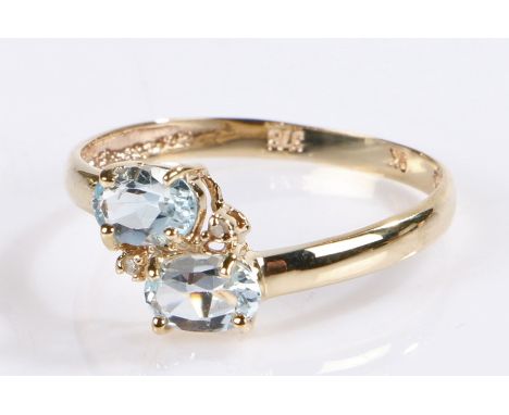 9 carat gold blue topaz and diamond ring, size N