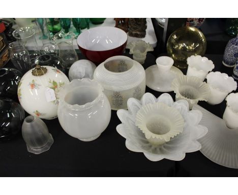 Large collection of lamp shades and chimneys for oil lamps