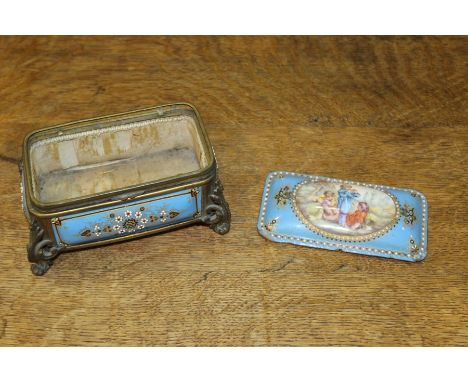 19th Century French enamel casket, with a hinged lid and figural panel above flower designs to the base, 15cm wide