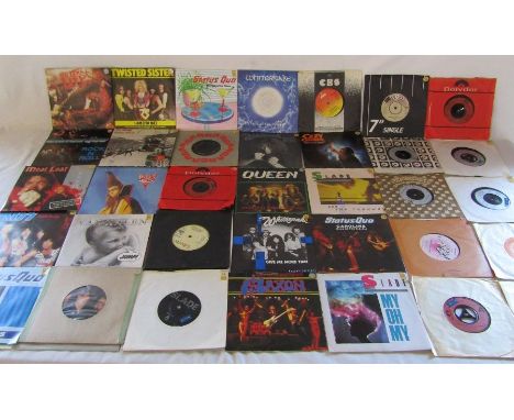 7" vinyl records including Status Quo, The Rolling Stones, Saxon, ACDC, Slade, Whitesnake, KISS, Doctor and the medics, Van H