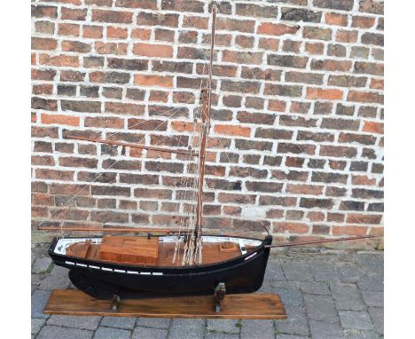 Hand built scale model of a Brittany fishing boat on stand. Length from bow to stern 107cm total length 182cm width 37cm