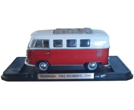 Die Cast Volkswagen 1962 Microbus on display stand. Unboxed. Single item from £5.99 UK, £7.99 Europe, £9.99 ROW. We can ship 