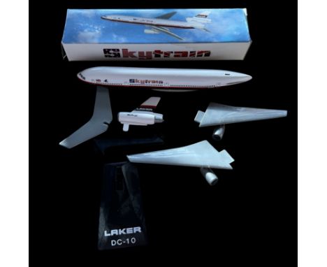Sky Train Laker DC10 model plane, in original box. Single item from £5.99 UK, £7.99 Europe, £9.99 ROW. We can ship a parcel u