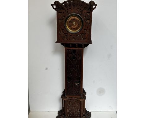 Carved miniature grandfather clock 