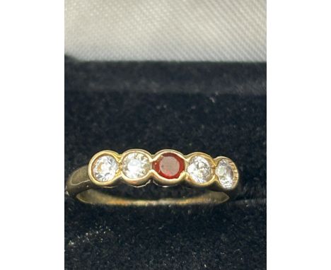 9ct Gold ring set with garnet & 4 cz stones Size I 1.9g 