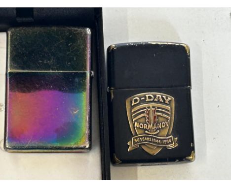 2 Zippo lighters 