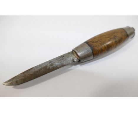 A Swedish barrel knife by John Engstrom,13.8cm long fully extended (not including suspension ring), the steel blade stamped '