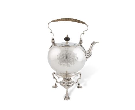 AN IRISH GEORGE II TEA KETTLE ON STAND, Dublin 1737, mark of Thomas Sutton, the baluster shaped tea kettle with rattan covere