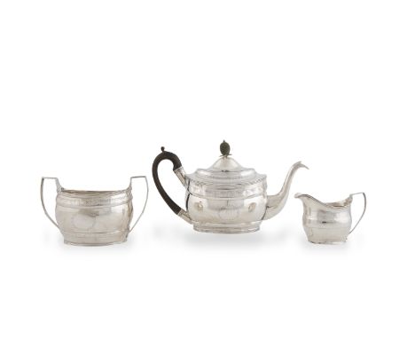 A GEORGE III MATCHED THREE PIECE TEA SERVICE, London 1806, mark of Peter and William Bateman, comprising tea pot, cream jug a