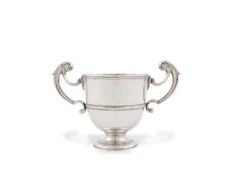 AN IRISH PROVINCIAL GEORGE II LOVING CUP, Cork c.1745, mark of George Hodder, the plain ovoid body with central girdle and ap
