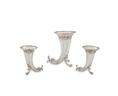 A GARNITURE OF THREE ROSE VASES, London 1905, mark of Sibray, Hall & Co. Ltd., in the shape of Celtic horn drinking vessels, 