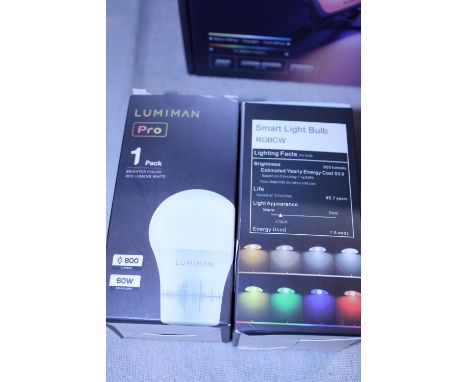 Two boxed smart light bulbs (un-checked) a/f 