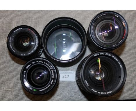 Five assorted camera lenses 
