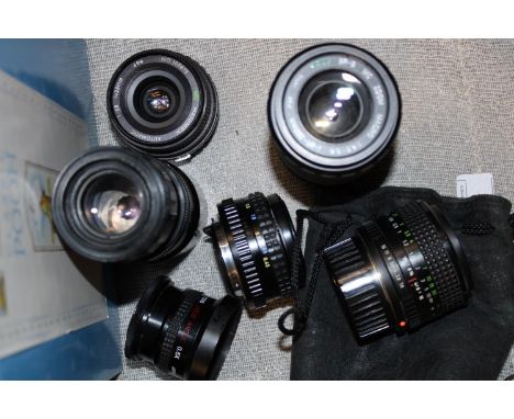 A selection of assorted camera lenses 