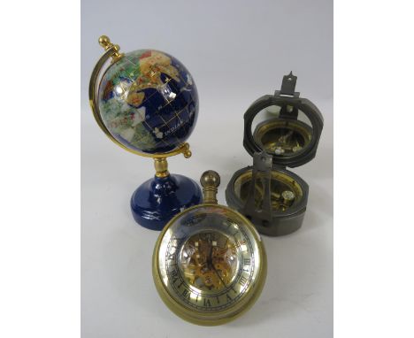 Mixed lot to include a Stanley London compass, a pocket watch paperweight and a small semi precious stone globe.