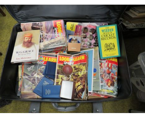 Suitcase of vintage look and learn magazines, coinsets, cricket related items etc