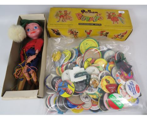 Pelham 'Twizzle' Puppet in playworn condition in original box plus a selection of metal pin badges. See photos. 