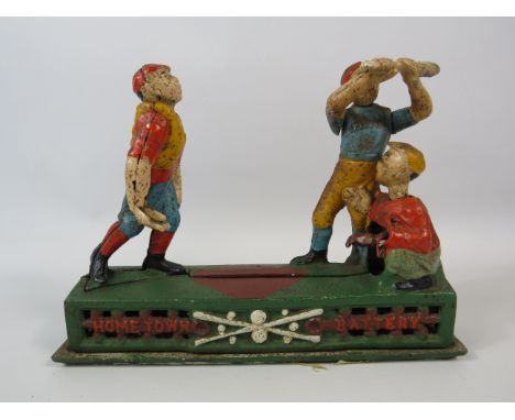 Vintage Home Time Battery cast iron mechanical money box.