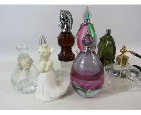 Selection of various vintage and art glass perfume bottles.