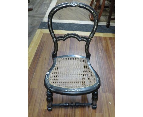 Victorian childs chair in ebonised oak with Mother of pearl inlaid embelishments,  Bergere seat.  Seat height 10 inches tall.