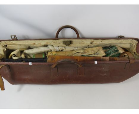 Vintage leather cricket bag containing two bats, pair of pads, gloves, box.  See photos.