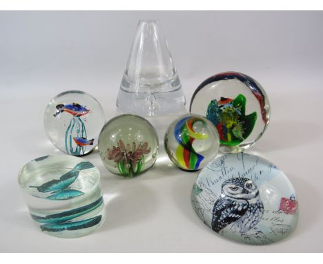 7 Various art glass paperweights.