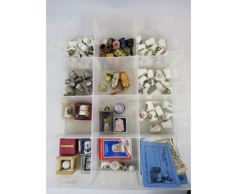 Large collection of various ceramic and metal collectable thimbles.