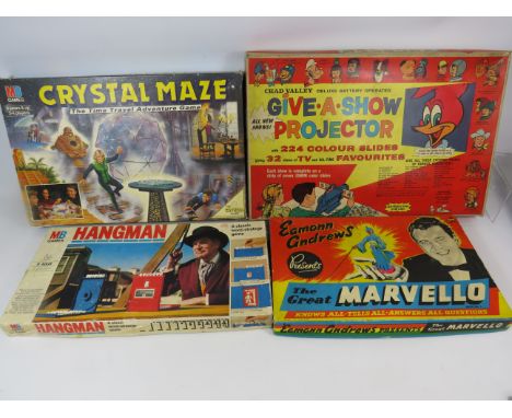 Four Vintage Games to include a Chad Valley Give-a-Show projector with box and slides. See photos. 