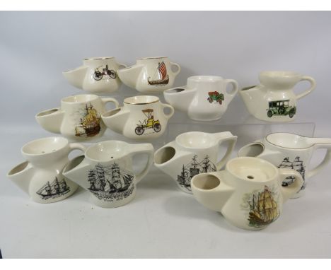 11 Vintage ceramic shaving mugs.