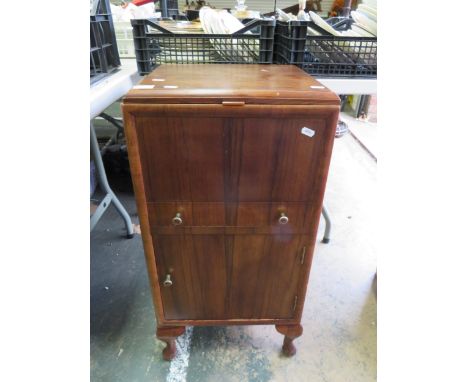 Vintage sewing station with large double lidded box to top,  slim bobbin drawer to centre and large cupboard storage below. S
