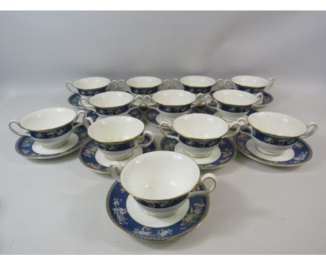 12 Wedgwood Blue Siam twin handle soup cups and saucers.