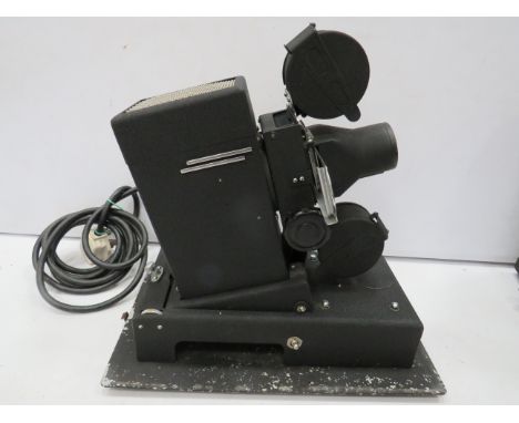 Vintage Eduscope slide projector in working order. Comes with original hard carry case. See photos. 