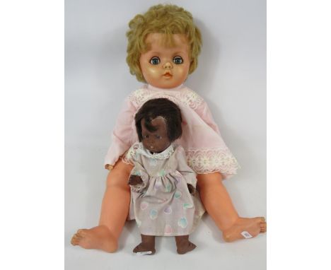 Two Vintage 1950's Dolls, one by FKO. See photos