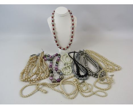 Selection of Faux pearl necklaces.