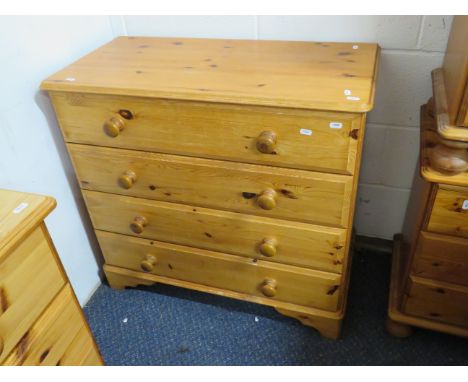 Nicely made Knotty pine four drawer chest. Turned handles with matching bracket feet it measures H:31 x W:33 x D:16 Inches. S