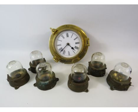 Quartz brass ships clock and 6 vintage light fittings with glass domes.