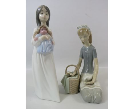 2 Nao Lladro figurines, a girl with a doll and a girl with a basket of flowers and a bird the tallest measures 9".