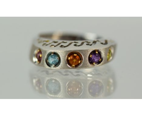 14ct White gold multi coloured gemstone set ring with raised pierced mount.  Finger size 'V'   Total weight 7.5g.   See photo