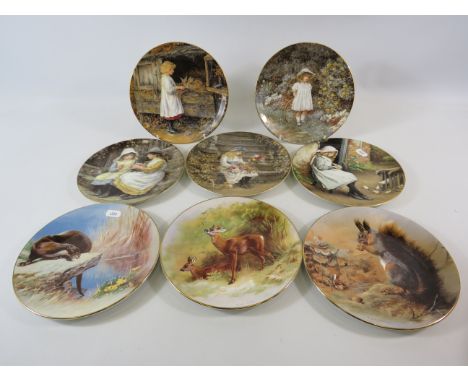 8 Collectable plates by Wedgwood and Royal Worcester.