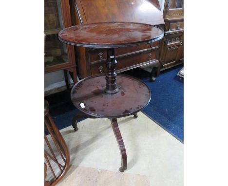 Mid Victorian Mahogany Two tier circular serving table .  Raised on four bracket feet and turned centre column it measures H: