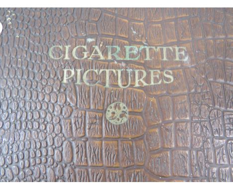 Well filled vintage album of Mostly Wills Cigarette cards from 1930's era.  Very good condition .  See photos