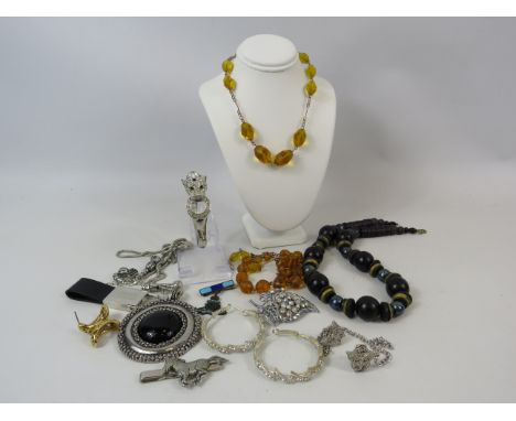 Various costume jewellery and a sterling silver Royal artillary enamel badge.