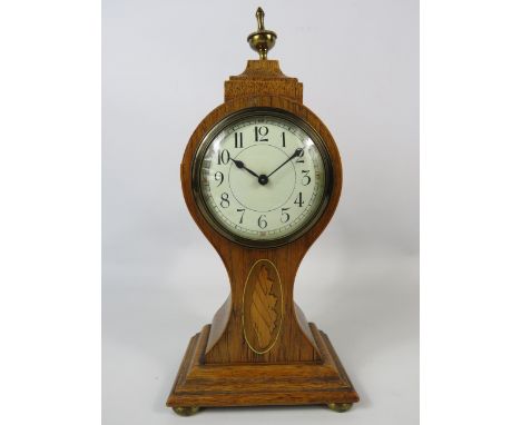 Vintage french mahogany mantle clock, 11.5" tall in running order.