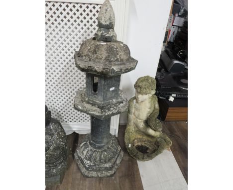 Cast concrete enclosed birdbath with finial to top along with a Yorkstone classical birdbath as a cherub.  24 inches tall. Se