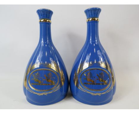 Pair of Whyte and Mackay ceramic empty whiskey bottles.